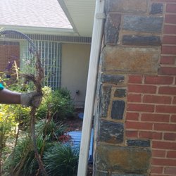 Drain Fighter Jetting & Drain Cleaning Services - Down spout full of tree roots. We were able to clear the stoppage.