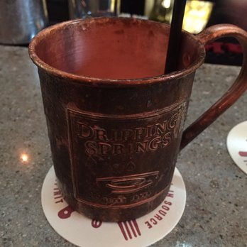 Jack Allen's Kitchen - Moscow Mule served in a copper mug (empty because it was so good! - American Near Me - Austin, Texas