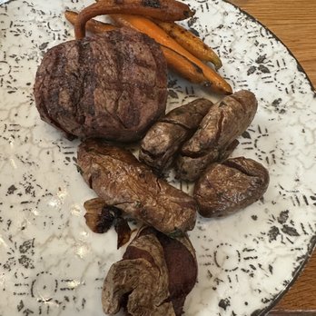 Bigfire - Filet mignon with carrots and crispy smashed potatoes. I would not recommend the smashed potatoes, they were over cooked and dry. - American Near Me - Orlando, Florida