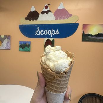Scoops Ice Cream Parlor - Peach cobbler in a cone - Ice Cream & Frozen Yogurt Near Me - Pigeon Forge, Tennessee Scoops Ice Cream Parlor - Peach cobbler in a cone - Ice Cream & Frozen Yogurt Near Me - Pigeon Forge, Tennessee