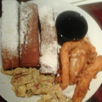 Copeland's - This is French toast Jazzy chicken breast and cajun scrambled eggs. It is very good I guarantee!-CrownMe - Cajun/Creole Near Me - Atlanta, Georgia