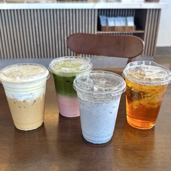 Auria Coffee - vanilla latte, strawberry matcha, black sesame, peach oolong (left to right) - Desserts Near Me - Buena Park, California Auria Coffee - vanilla latte, strawberry matcha, black sesame, peach oolong (left to right) - Desserts Near Me - Buena Park, California