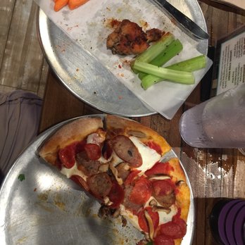 Pizza Hyena - The remains of a Can't Decide pizza and African Burbere dry rub wings - Pizza Near Me - Surfside Beach, South Carolina Pizza Hyena - The remains of a Can't Decide pizza and African Burbere dry rub wings - Pizza Near Me - Surfside Beach, South Carolina