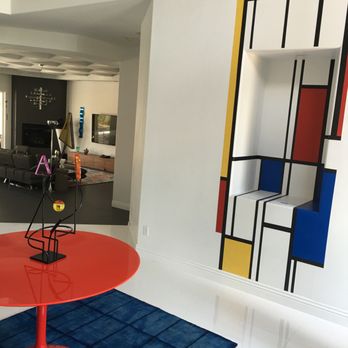 Ken Wolfson Interior Design - Jeremy L's entrance foyer showing gloss white floors and part of the mondrian-esque mural curated from a local and designed by Ken Wolfson. - Interior Design Near Me - Las Vegas, Nevada Ken Wolfson Interior Design - Jeremy L's entrance foyer showing gloss white floors and part of the mondrian-esque mural curated from a local and designed by Ken Wolfson. - Interior Design Near Me - Las Vegas, Nevada