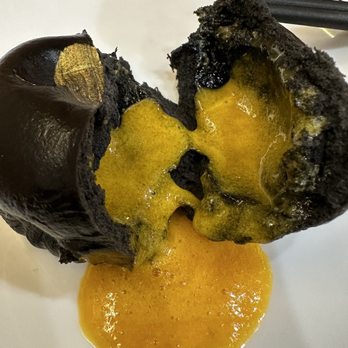 One More Bite Dumpling House - What's inside the black bun...delish sweet custard. - Dim Sum Near Me - Wildomar, California One More Bite Dumpling House - What's inside the black bun...delish sweet custard. - Dim Sum Near Me - Wildomar, California