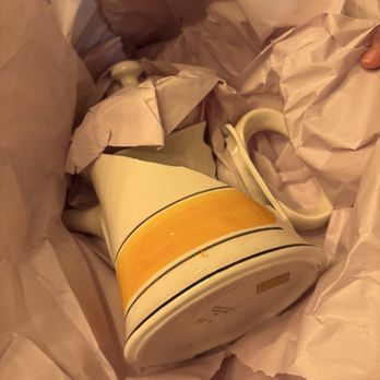 Mayzlin Relocation - Broken porcelain teapot (packed by movers). - Movers Near Me - Charlotte, North Carolina