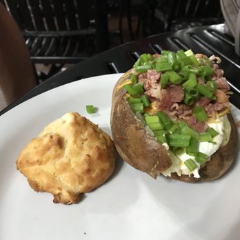 Bennett's Pit Bar-B-Que - Loaded baked potato. Fantastic!!! - Barbeque Near Me - Pigeon Forge, Tennessee Bennett's Pit Bar-B-Que - Loaded baked potato. Fantastic!!! - Barbeque Near Me - Pigeon Forge, Tennessee