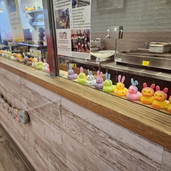 Duck Donuts - Inside - donut fryer and duckie collection - Donuts Near Me - White Plains, New York
