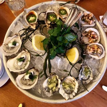 Lure Fishbar - Signature oysters (pineapple relish, jalapeno ponzu, caviar & vodka, wasabi leaf) - Seafood Near Me - New York, New York