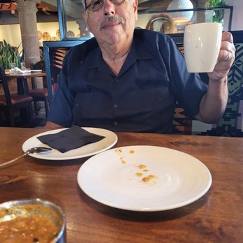 La Cosecha Mexican Table - The man enjoying a good cup of coffee. - New Mexican Cuisine Near Me - New Braunfels, Texas