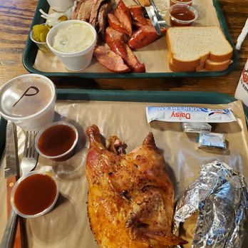 Hard Eight BBQ - top is brisket and jalepeno cheddar sasuage, mac and cheese and banana pudding. Bottom is half chicken and baked potato and peach cobbler. - Barbeque Near Me - The Colony, Texas Hard Eight BBQ - top is brisket and jalepeno cheddar sasuage, mac and cheese and banana pudding. Bottom is half chicken and baked potato and peach cobbler. - Barbeque Near Me - The Colony, Texas