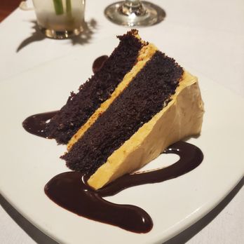 Saluda's - Peanut Butter Chocolate Cake - New American Near Me - Columbia, South Carolina Saluda's - Peanut Butter Chocolate Cake - New American Near Me - Columbia, South Carolina
