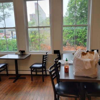 Wiarton Inn - a dining room with a table and chairs - Thai Near Me - Wiarton, Ontario