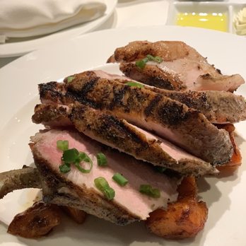 Emeril's - Grilled Pork Chop - New American Near Me - New Orleans, Louisiana Emeril's - Grilled Pork Chop - New American Near Me - New Orleans, Louisiana
