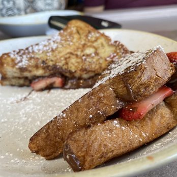Copper Blues Rock Pub & Kitchen - Chocolate French toasts with strawberries - Bars Near Me - Doral, Florida Copper Blues Rock Pub & Kitchen - Chocolate French toasts with strawberries - Bars Near Me - Doral, Florida