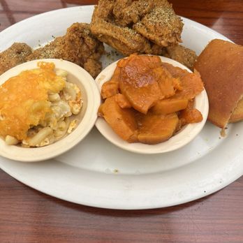Stephanie's Restaurant - Lemon pepper wing plate with yams and Mac & cheese and cornbread. - American Near Me - Greensboro, North Carolina Stephanie's Restaurant - Lemon pepper wing plate with yams and Mac & cheese and cornbread. - American Near Me - Greensboro, North Carolina