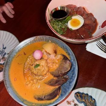 Soothr - Roasted Pork Over Rice ; Stewed Beef and Roasted Vegetable Masamun Curry - Thai Near Me - New York, New York Soothr - Roasted Pork Over Rice ; Stewed Beef and Roasted Vegetable Masamun Curry - Thai Near Me - New York, New York