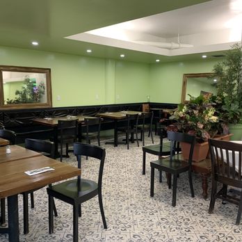 Miami Halal - tables and chairs in a restaurant - Halal Near Me - North Bay Village, Florida Miami Halal - tables and chairs in a restaurant - Halal Near Me - North Bay Village, Florida