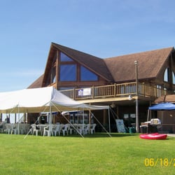 River Valley Golf Course - River Valley Clubhouse back yard with tent.