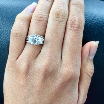 Portillo Jewelers - East-West marquise solitaire pictures with ring guard. - Jewelry Near Me - McAllen, Texas Portillo Jewelers - East-West marquise solitaire pictures with ring guard. - Jewelry Near Me - McAllen, Texas