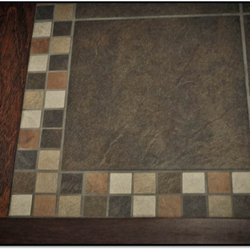 Northern Colorado Carpets - Mosaic border for tile entry and hardwood install.