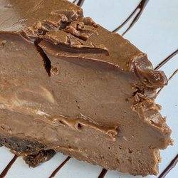 A piece of the Triple Chocolate Cheesecake.