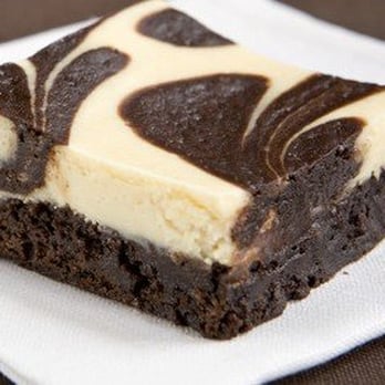 Patios Del Lago - a piece of brownie on a napkin - Desserts Near Me - Lakehills, Texas Patios Del Lago - a piece of brownie on a napkin - Desserts Near Me - Lakehills, Texas