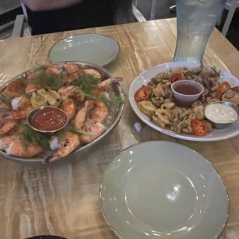 Seaside Oyster Bar - Peel n shrimp (left) and calamari (right) - Seafood Near Me - Suwanee, Georgia Seaside Oyster Bar - Peel n shrimp (left) and calamari (right) - Seafood Near Me - Suwanee, Georgia