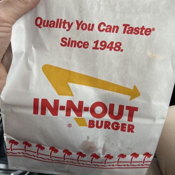 In-N-Out Burger - ows a person holding a bag - Burgers Near Me - Spanish Fork, Utah