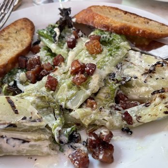 Manny's Bistro - Lunch at Manny's Bistro is starting with a yummy grilled Caesar salad. Who knew?! It's different and delicious! - French Near Me - New York, New York Manny's Bistro - Lunch at Manny's Bistro is starting with a yummy grilled Caesar salad. Who knew?! It's different and delicious! - French Near Me - New York, New York