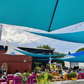 Monon 30 - Pallet seating areas covered for shade - Venues & Event Spaces Near Me - Indianapolis, Indiana