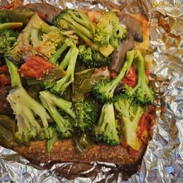 Leftover Sicilian slice with broccoli, mushrooms, and red and green bell peppers Leftover Sicilian slice with broccoli, mushrooms, and red and green bell peppers