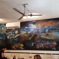 El Argüende - Wonderful paintings decorate this restaurant.