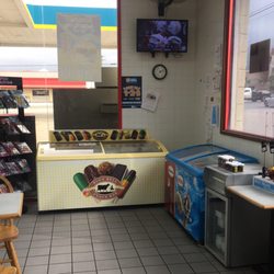 Valero - Little seating area where you can watch your favorite Texas / SouthWest team play on the tv while you enjoy a cup of pecan coffee!