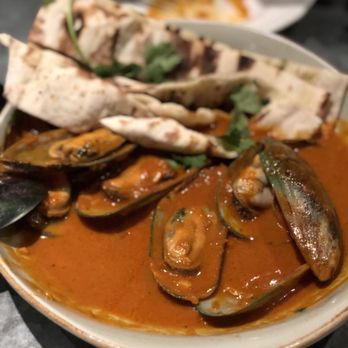 Herringbone Waikiki - Mussels in red curry sauce with flat bread - these guys were huge! - Seafood Near Me - Honolulu, Hawaii Herringbone Waikiki - Mussels in red curry sauce with flat bread - these guys were huge! - Seafood Near Me - Honolulu, Hawaii