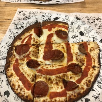 Azzip Pizza - The Triple Double on a cauliflower crust... missing one piece because I got too excited to take a bite - Pizza Near Me - Terre Haute, Indiana