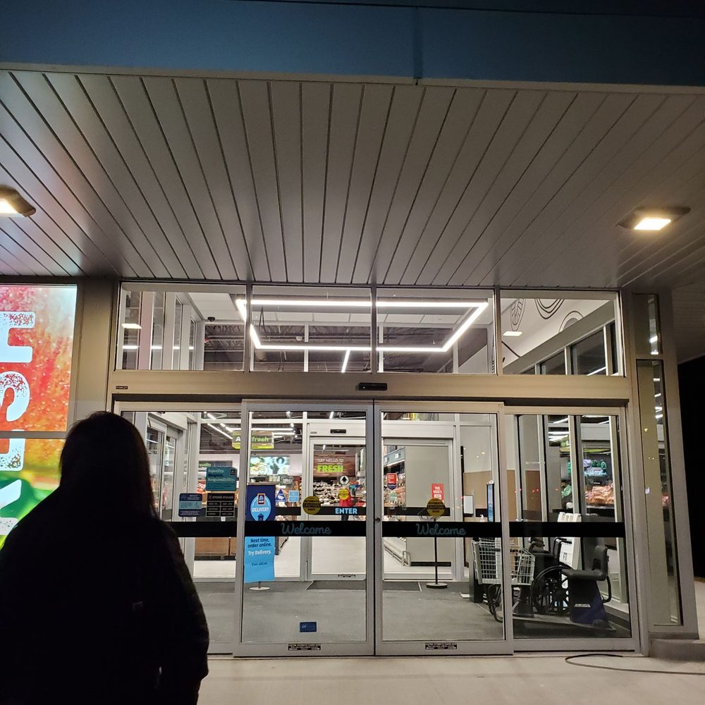 ALDI - the entrance to a store at night - Grocery Near Me - Omaha, Nebraska
