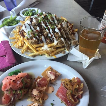 Hapa J's - Hapa J'a Manfrys: fries topped off with American & cheddar cheese, bbq sauce, Kahlua pork & green onions...must have! - Hawaiian Near Me - San Clemente, California Hapa J's - Hapa J'a Manfrys: fries topped off with American & cheddar cheese, bbq sauce, Kahlua pork & green onions...must have! - Hawaiian Near Me - San Clemente, California