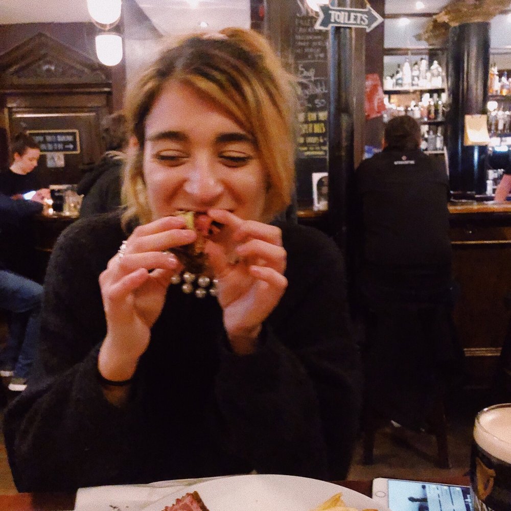 Arthur's Pub - My friend enjoying her half of the corned beef sandwich and the friendly local man that talked to us behind her lol - Bars Near Me - Dublin, D Arthur's Pub - My friend enjoying her half of the corned beef sandwich and the friendly local man that talked to us behind her lol - Bars Near Me - Dublin, D