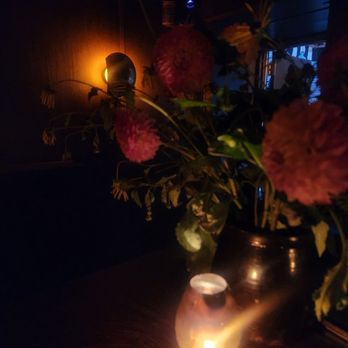 The Coral Wig - Cute little lantern and flowers - Cocktail Bars Near Me - Baltimore, Maryland