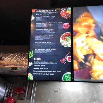 LuLu Poke - a menu on the wall of a restaurant - Poke Near Me - New York, New York LuLu Poke - a menu on the wall of a restaurant - Poke Near Me - New York, New York