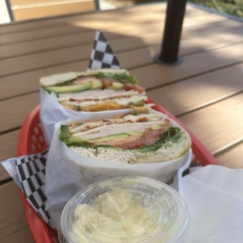 Isabel’s Cafe - Turkey avocado sandwich on jalapeño cheddar bagel with side of potato salad - Cafes Near Me - Tracy, California
