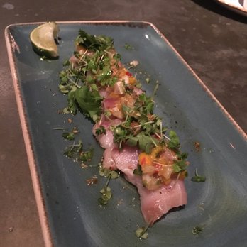 Herringbone Waikiki - Yellowtail Crudo with truffle Yusuf, crispy garlic, and green onion - Seafood Near Me - Honolulu, Hawaii