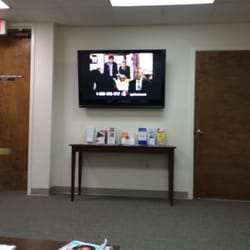 Hussam Kujok, MD - The waiting room with a big tv.
