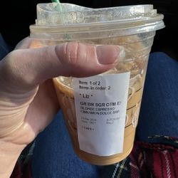 Starbucks - "Grande Iced Oatmilk Shaken Espresso w/ cinnamon dolce syrup"