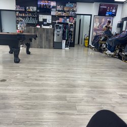 Magic Touch Barber Shop - They even have a pool table in case you have to wait.