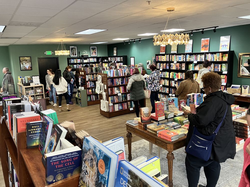 Queen Takes Book Logo