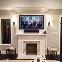 Madison's Home Theater - Samsung picture frame TV mounted with a Sonos Soundbar.
