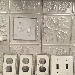 I emailed this photo to customer service and was told all orders were custom made.  However, clearly the outlet covers are white, not silver