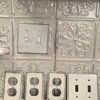 American Tin Ceilings - I emailed this photo to customer service and was told all orders were custom made.  However, clearly the outlet covers are white, not silver - Building Supplies Near Me - Bradenton, Florida